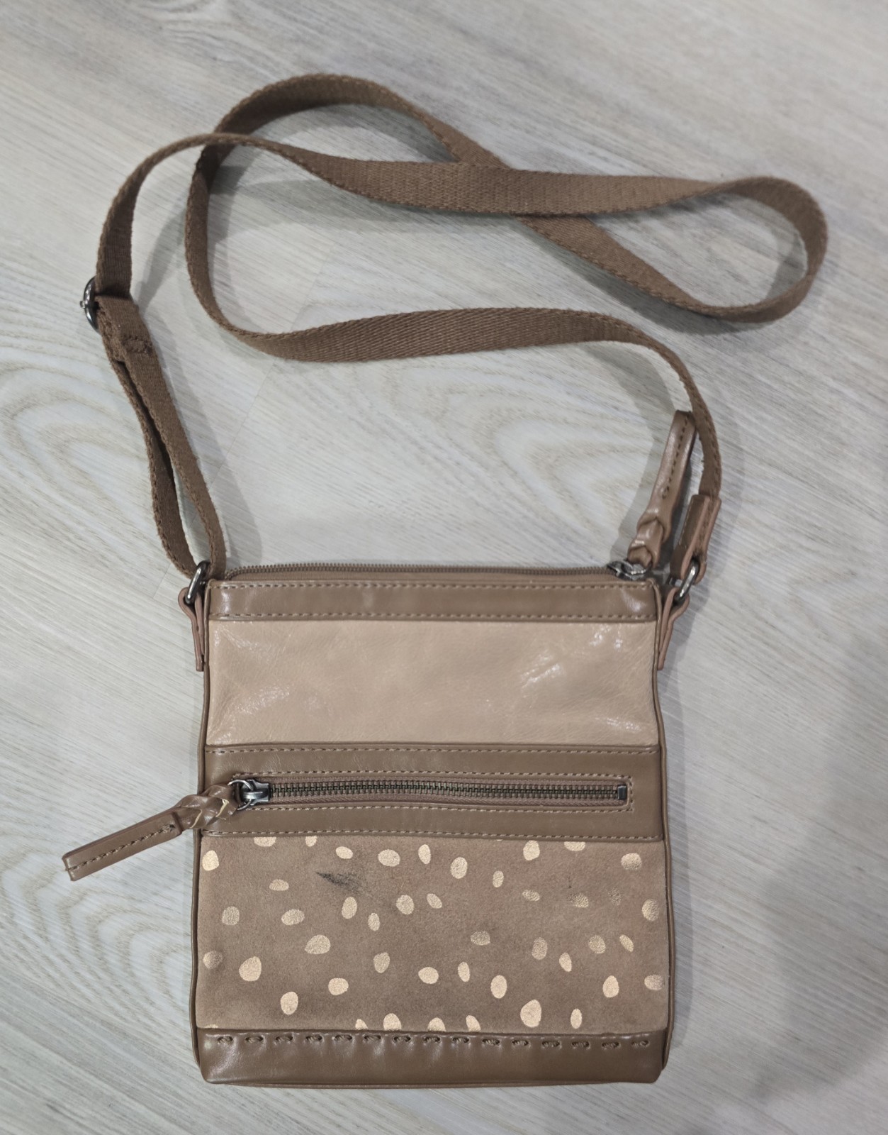 The Sak Pax painted leather crossbody bag with a polka dot design Mark On Front