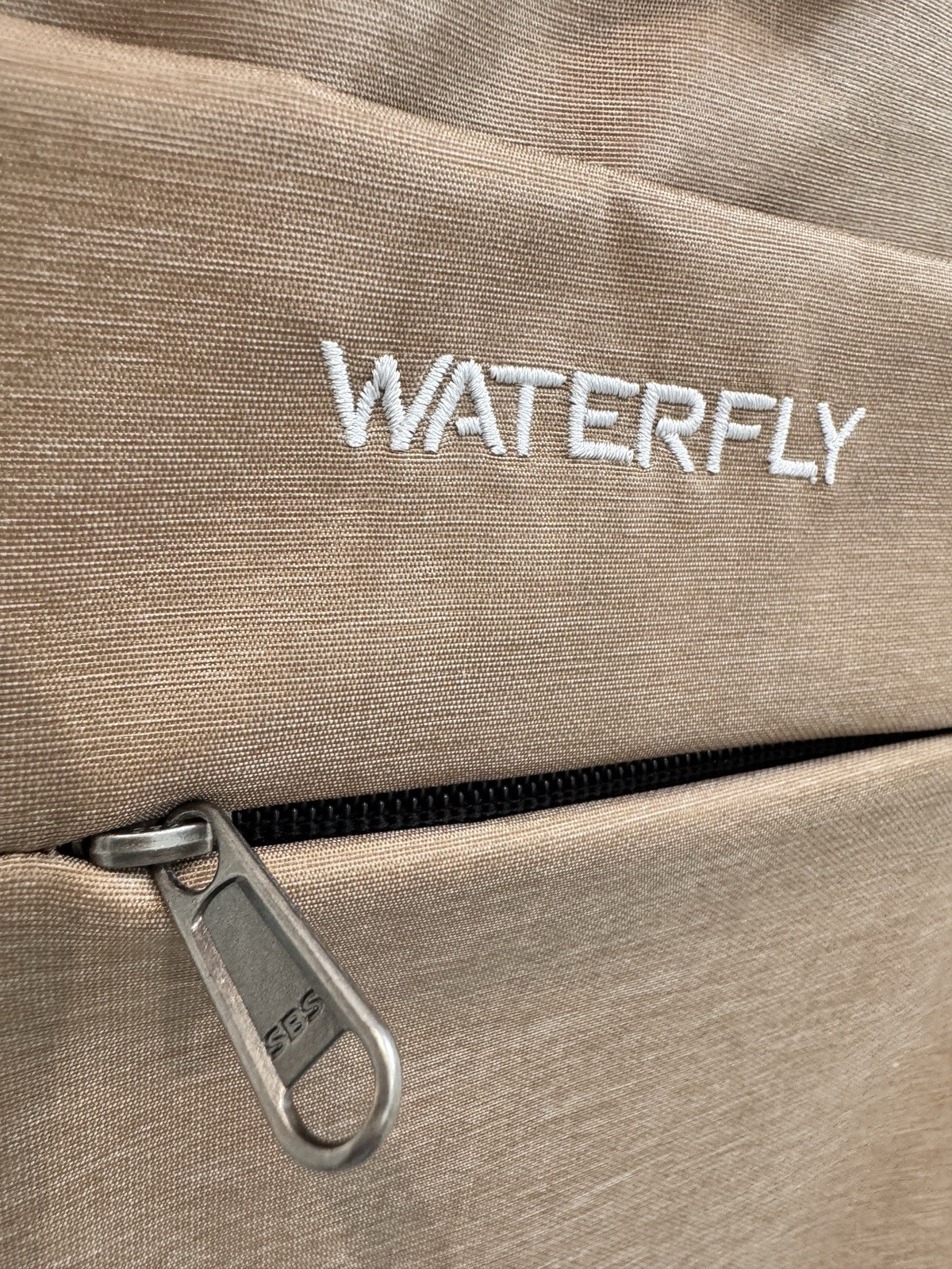 WATERFLY Crossbody Sling Bag Tan Travel Anti Theft Style Multi Pocket NWT