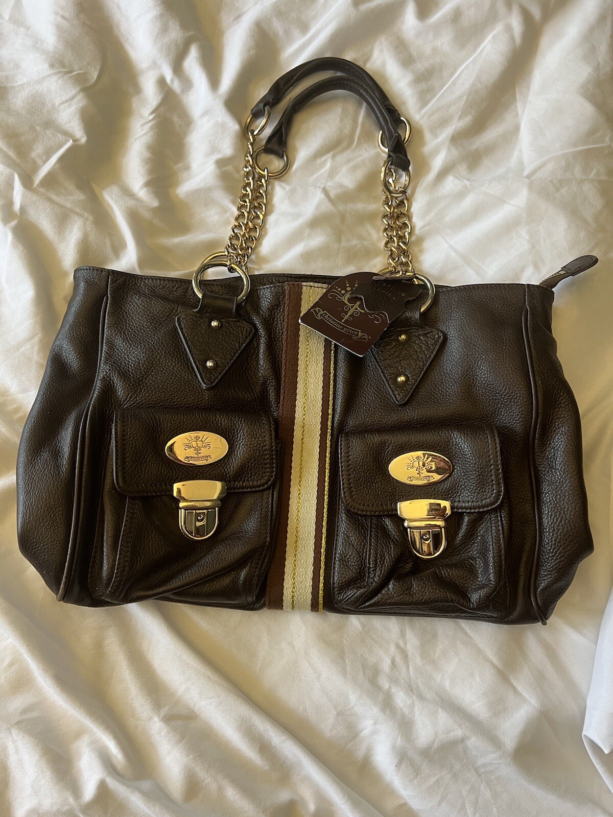 Genuine leather handbag/carry-on bag for women pre-owned, new with tags.