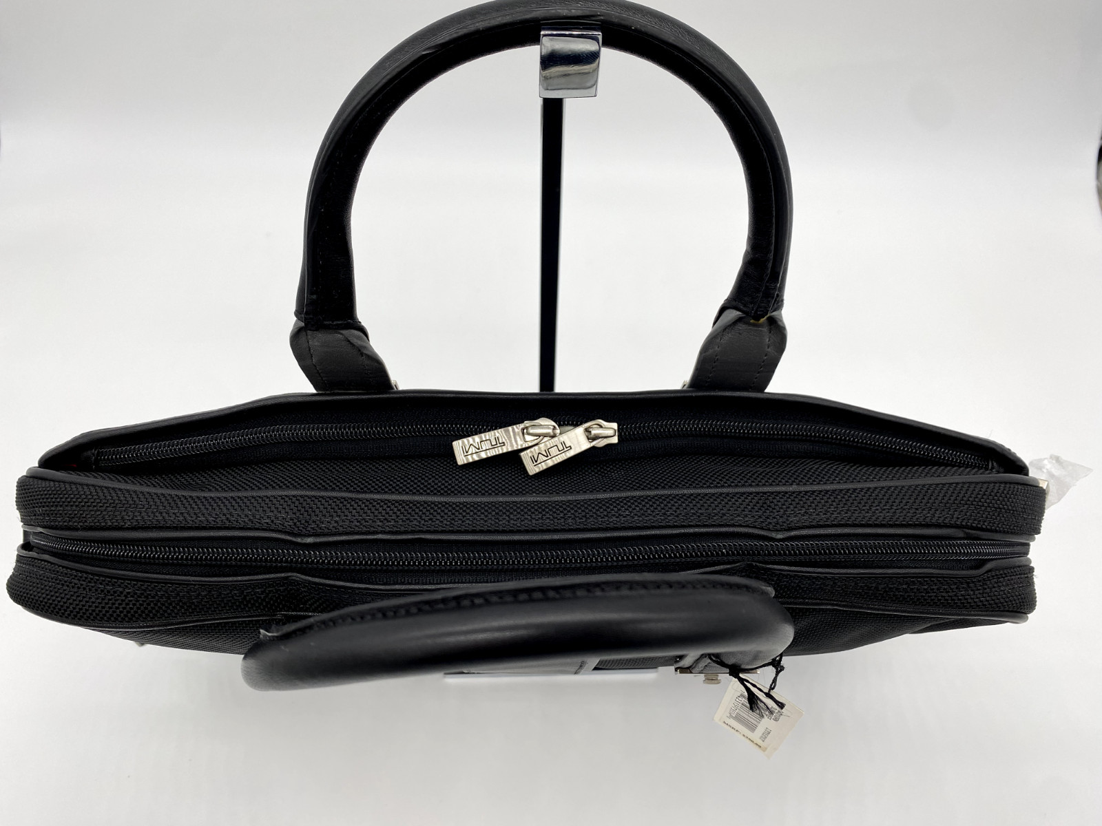 Tumi Elements Ballistic Nylon w/Leather Trim Handbag 15.5″ (Black)