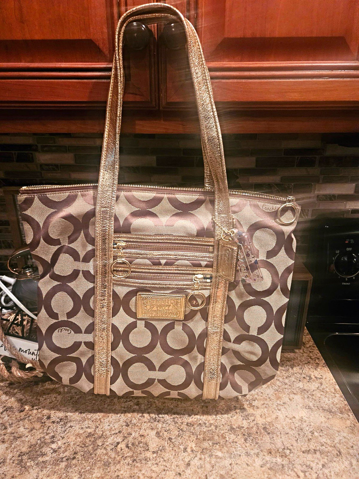 Coach Signature Logo Tote Medium Brown Beige Metallic Gold Handles Zip