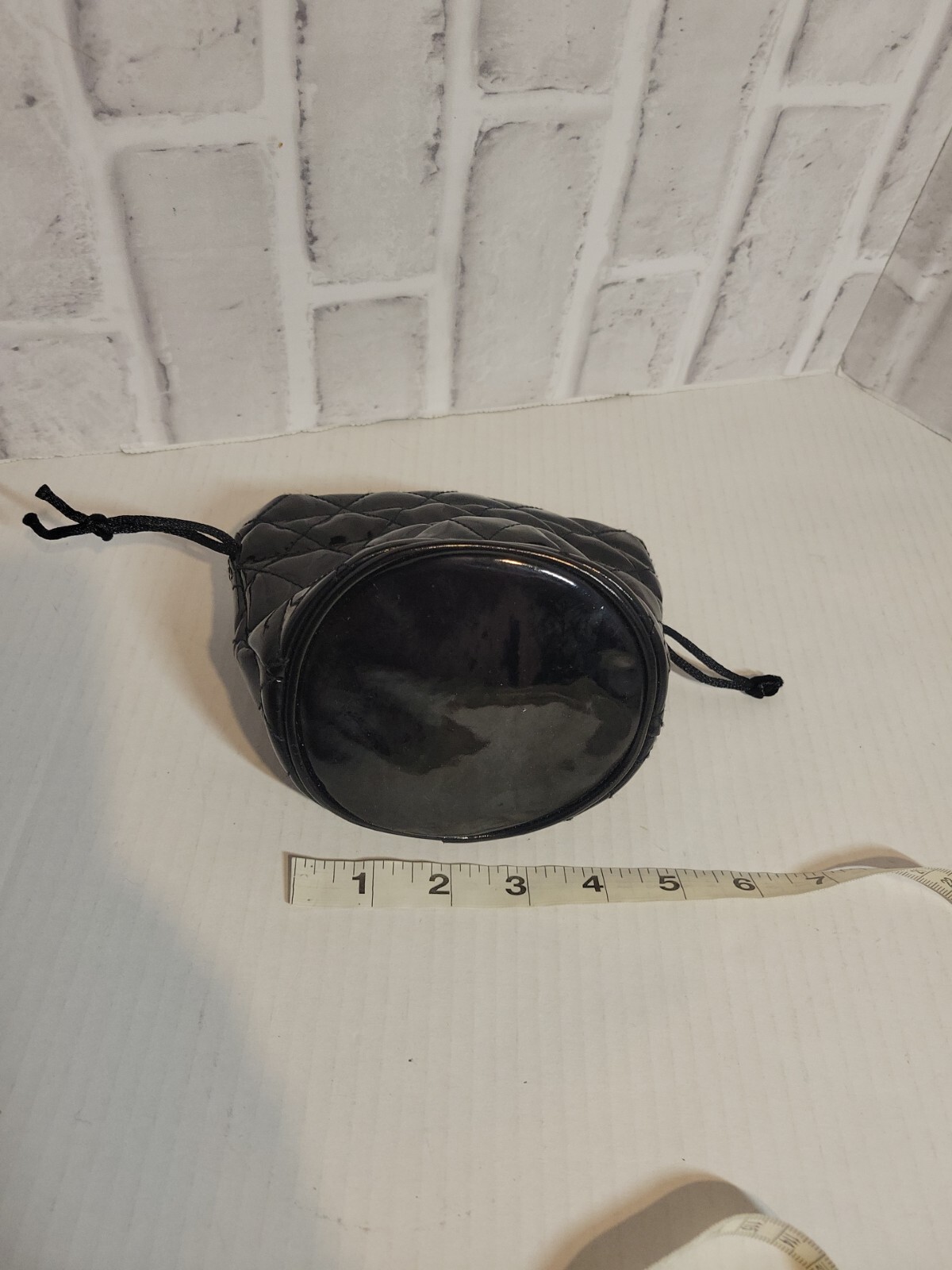 GUESS Black Quilted Patent Vegan Leather Satin Lined Drawstring Bag /Pillow