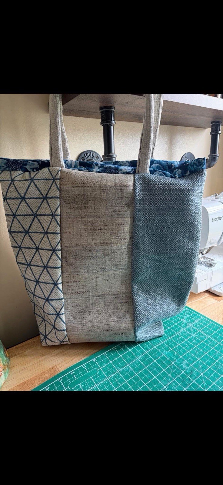 Handmade up-cycled upholstery fabric tote bags with 100% cotton floral lining.