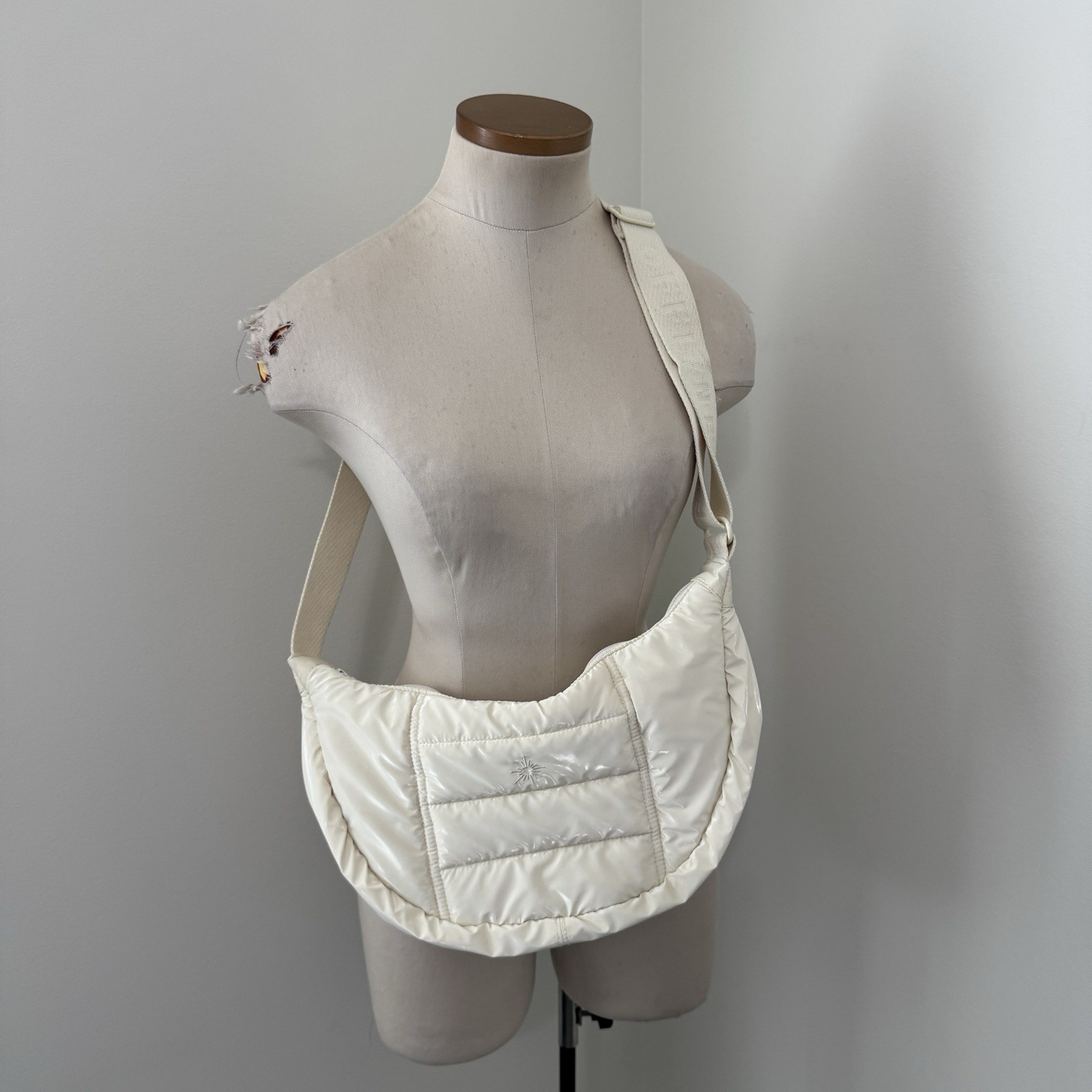 OFFLINE by Aerie Puffer Crescent Crossbody Bag Cream Shiny Quilted Travel Sling