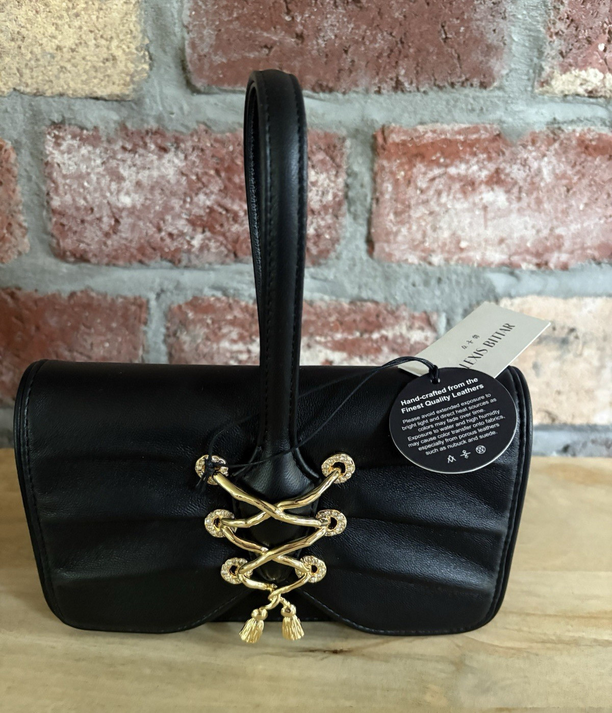 Alexis Bittar Women’s Black leather 14k Gold laceup wristlet Wallet clutch purse